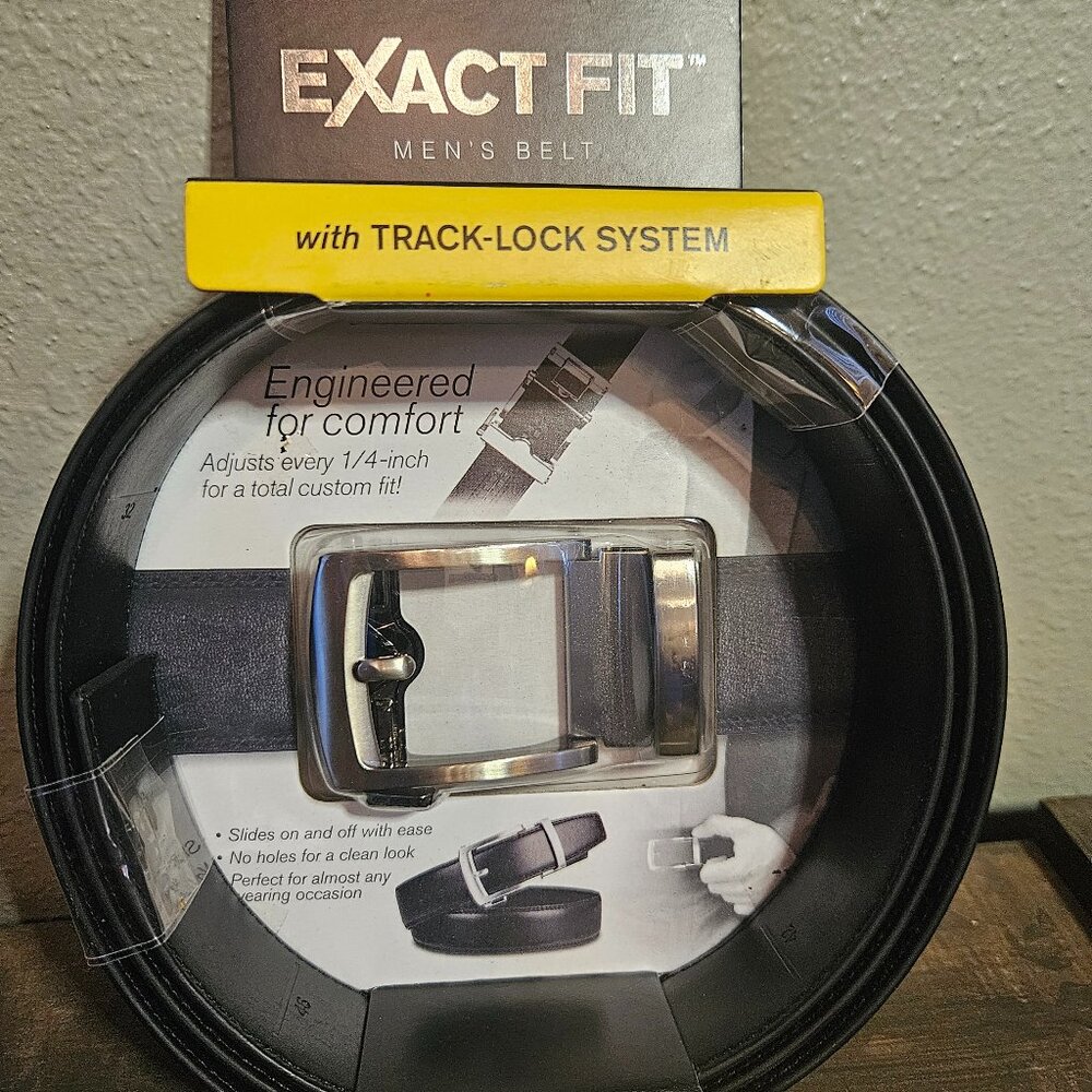 Exact Fit Men's Adjustable Belt    New in package   Fits sizes 28" to  48"